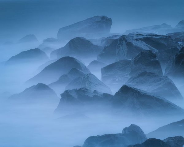 Jaynes Gallery 아티스트의 USA-New Jersey-Cape May National Seashore-Scenic of fog-covered rocks on shore작품입니다.